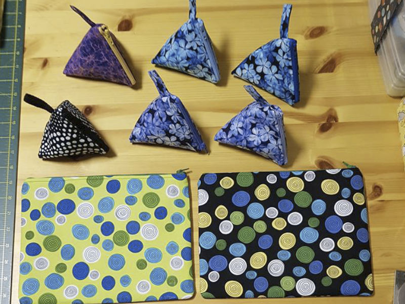 Amanda's triangle coin purses and makeup bags